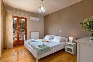 Säng eller sängar i ett rum på La Serena Residence & Farm with Heated Pool