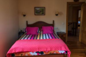 Un pat sau paturi într-o cameră la Casa Lucia