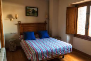 Tempat tidur dalam kamar di Casa Lucia