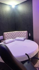 Кровать или кровати в номере Versat Motel