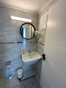 A bathroom at ATICI HOTEL