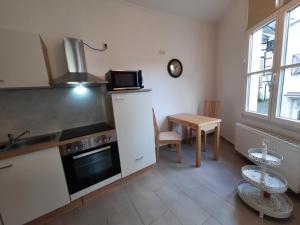 Kuchyň nebo kuchyňský kout v ubytování Ferienwohnung Langenberg Altstadt WiFi Netflix + 13 fotografií