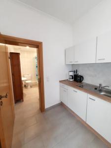 Kuchyň nebo kuchyňský kout v ubytování Ferienwohnung Langenberg Altstadt WiFi Netflix