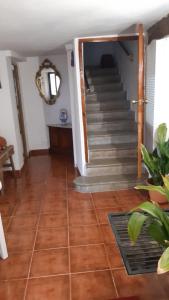 a hallway with stairs in a house at Casa de Pueblo ,Sauca in Saúca