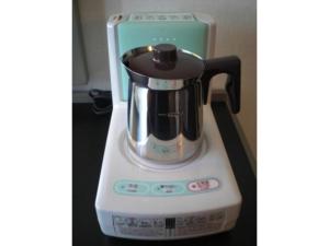 a blender sitting on top of a counter at Grand Central Hotel - Vacation STAY 19599v in Tokyo