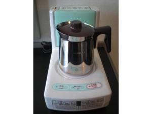 a blender sitting on top of a counter at Grand Central Hotel - Vacation STAY 19614v in Tokyo
