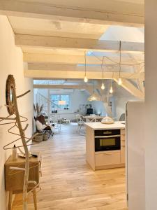 Kuchyň nebo kuchyňský kout v ubytování SOLEY - Stylische Ferienwohnung idyllisch gelegen
