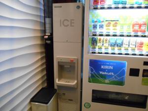 an ice machine with a drink dispenser in a store at Grand Central Hotel - Vacation STAY 19609v in Tokyo