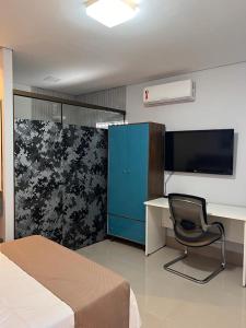 Televizorius ir (arba) pramogų centras apgyvendinimo įstaigoje Suites Stival Centro