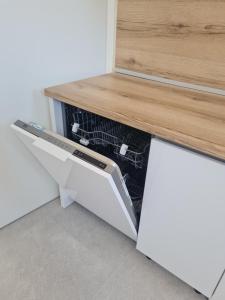 Kuchyňa alebo kuchynka v ubytovaní Holiday Apartment Marijana
