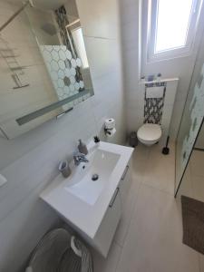 Kúpeľňa v ubytovaní Holiday Apartment Marijana