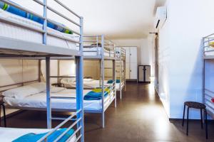 A bed or beds in a room at LoL Hostel Siracusa