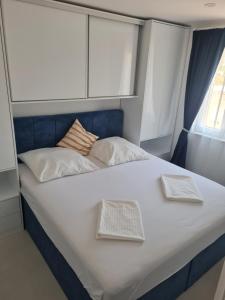 Posteľ alebo postele v izbe v ubytovaní Holiday Apartment Marijana