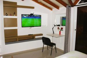 TV o dispositivi per l'intrattenimento presso Dunas De Areia Preta