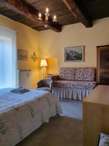 En eller flere senge i et værelse på Il Casolare del Medio Olona