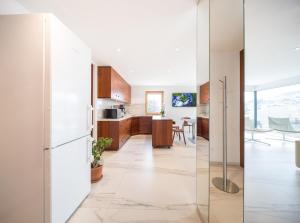 Kuchyň nebo kuchyňský kout v ubytování Apartment Ronch + 13 fotografií