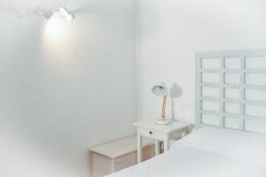 Posteľ alebo postele v izbe v ubytovaní L'Escala Vista Mar + 26 fotografií