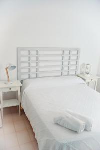 Posteľ alebo postele v izbe v ubytovaní L'Escala Vista Mar