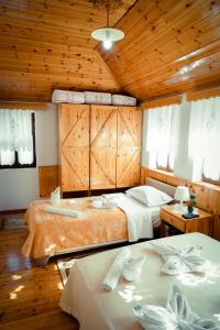 Voodi või voodid majutusasutuse Hotel Domino toas