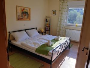 Posteľ alebo postele v izbe v ubytovaní Villa Mebelle mit Meerblick