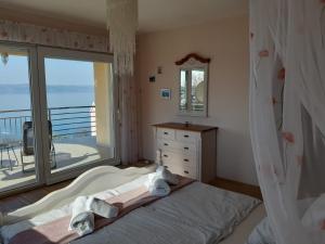 Posteľ alebo postele v izbe v ubytovaní Villa Mebelle mit Meerblick