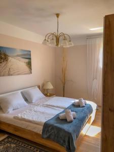 Posteľ alebo postele v izbe v ubytovaní Villa Mebelle mit Meerblick
