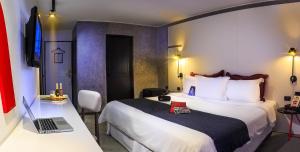 Katil atau katil-katil dalam bilik di BTH Hotel – Boutique Concept