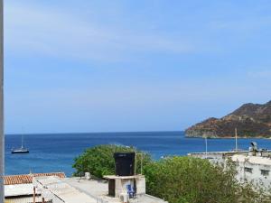a view of the ocean from a building at Tayrona Dive Center in Taganga