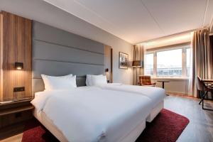 Postel nebo postele na pokoji v ubytování Radisson Blu Hotel Nydalen, Oslo