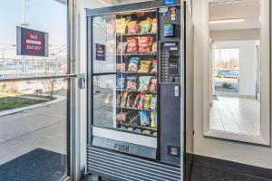 a refrigerator with food inside of a store at Motel 6-Fort Wayne, IN in Fort Wayne