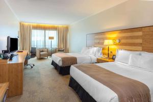 Cama o camas de una habitación en Sonesta Hotel Osorno