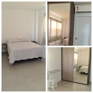 En eller flere senge i et værelse på Apartamento encantador na praia de Navegantes