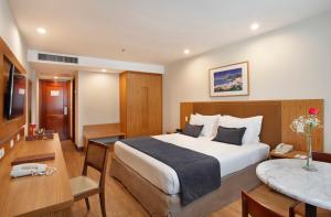 Voodi või voodid majutusasutuse Windsor Excelsior Copacabana toas