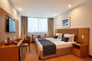 Voodi või voodid majutusasutuse Windsor Excelsior Copacabana toas