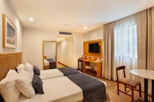 Voodi või voodid majutusasutuse Windsor Excelsior Copacabana toas