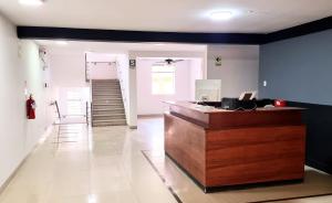 Ο χώρος του λόμπι ή της ρεσεψιόν στο Hotel Taurus