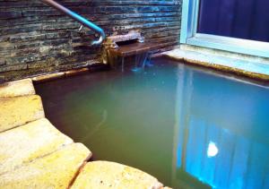 Bazén v ubytování ATAMI SPRING TERRACE HOTEL nebo v jeho okolí