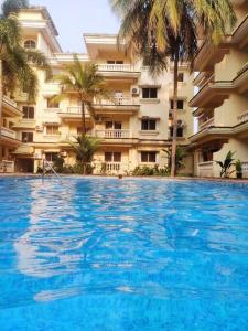 Bazén v ubytování Seacoast Retreat- Lovely 2 BHK apartment with pool nebo v jeho okolí