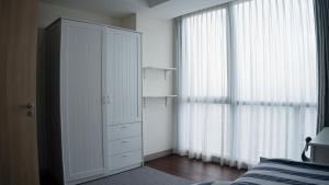 Postel nebo postele na pokoji v ubytování Fairview House apartment karawaci