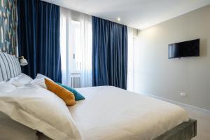 Postel nebo postele na pokoji v ubytování Il Pumo - Apulian Rooms Bari Calefati