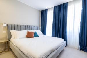 Postel nebo postele na pokoji v ubytování Il Pumo - Apulian Rooms Bari Calefati