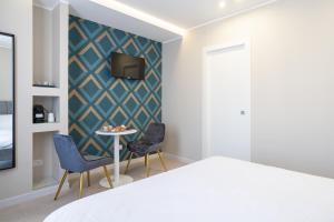 Postel nebo postele na pokoji v ubytování Il Pumo - Apulian Rooms Bari Calefati