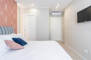 Postel nebo postele na pokoji v ubytování Il Pumo - Apulian Rooms Bari Calefati