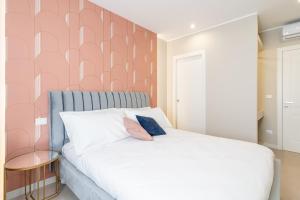Postel nebo postele na pokoji v ubytování Il Pumo - Apulian Rooms Bari Calefati