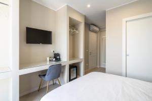 Postel nebo postele na pokoji v ubytování Il Pumo - Apulian Rooms Bari Calefati