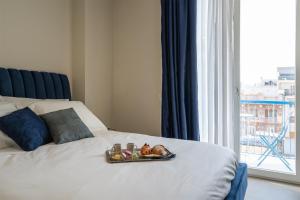 Postel nebo postele na pokoji v ubytování Il Pumo - Apulian Rooms Bari Calefati