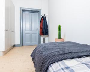 Letto o letti in una camera di Holterman Hostel
