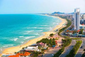 an aerial view of a beach and the ocean at ELC Beach Hotel in Da Nang