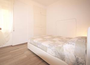 Posteľ alebo postele v izbe v ubytovaní Appartamento Bellavista