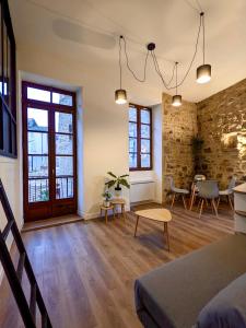 Ruang duduk di Joli appartement de charme rénové en centre ville